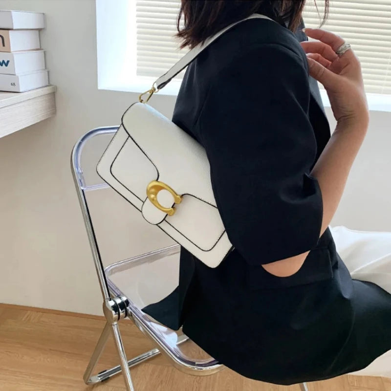 2025 Primavera Nova Bolsa Feminina Tabby God Bolsa Francesa Nas Axilas Bolsa De Ombro De Pão Francês De Alta Qualidade
